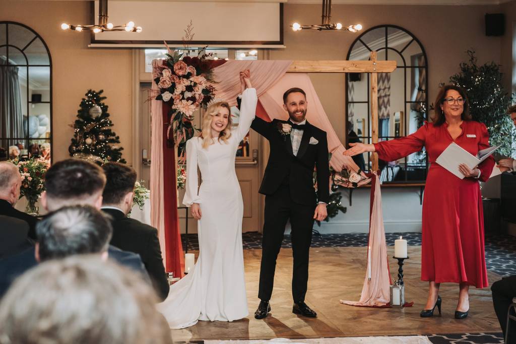 Couple celebrating as they are declared married