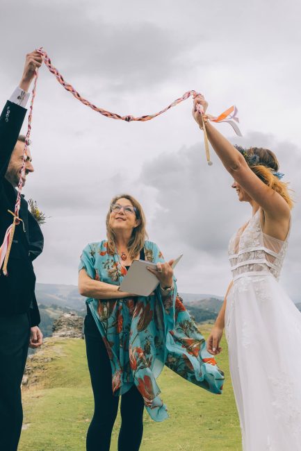 Jane leading an intimate outdoor elopement ceremony